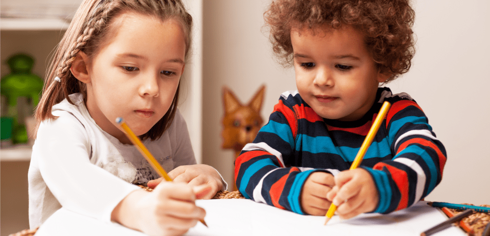 Young Girl and Boy Drawing